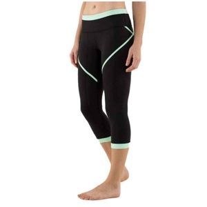 Lululemon Women's Roll Out Crop Yoga Leggings Pants Size 4 Black / Fresh Teal